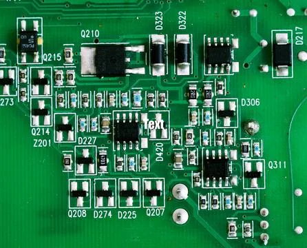 Close up of a printed green computer circuit board with identification numb.. Stock Photos