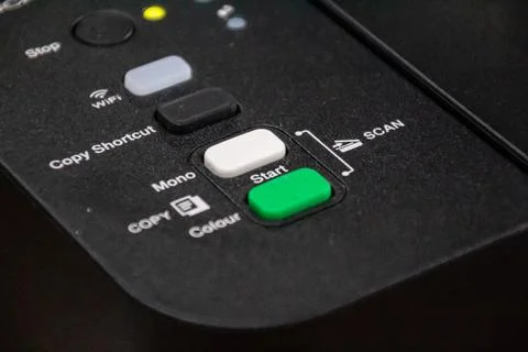 Close-up of printer control panel with green start button and copy shortcut f Stock Photos