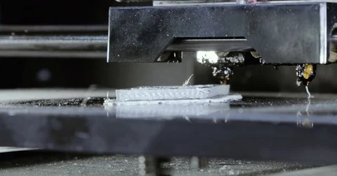 Close up of Printing with Plastic Wire Filament on 3D Printer Stock Footage 78875714
