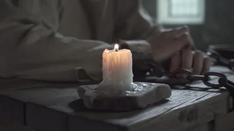 Close up of prisoner hands locked in shackles scratching each other, camera trac Stock Footage 339631327