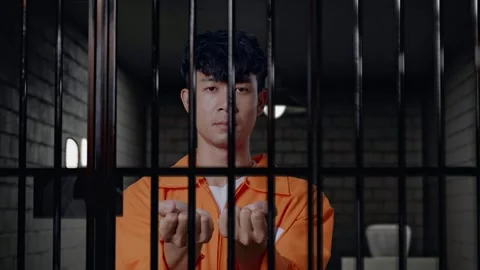 Close Up Of Prisoner Stretching Out The Hands Surrender Himself In Prison Stock Footage 273254382