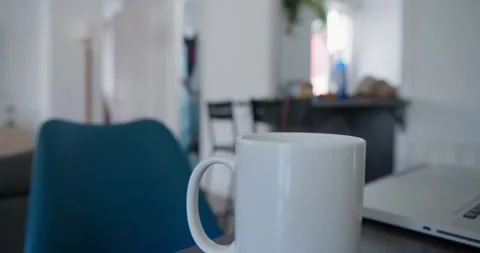 A close-up of a pristine white ceramic mug Stock Footage 334652087