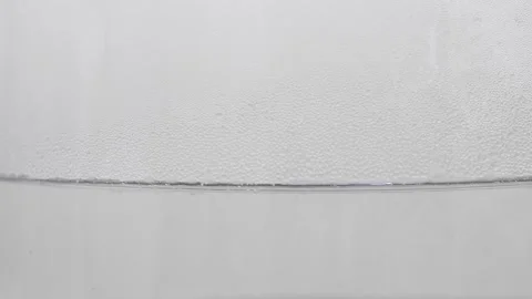 Close-up of the process of boiling water in an electric kettle 库存影片 289483667