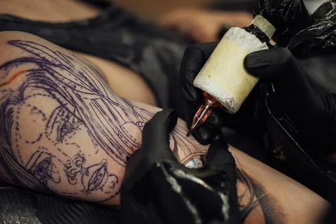 Close Up of Process of Creating Tattoo Art, Artist Draws on the Clients Skin Stock Photos