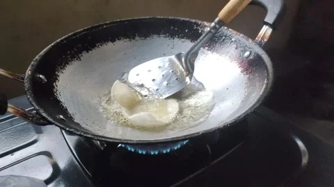 A Close-up of The Process of Frying Crackers Video stock 332450194
