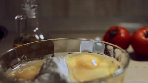 Close up process of handmade dough from flour. Chicken eggs and a pile of white Stock Footage 144819544