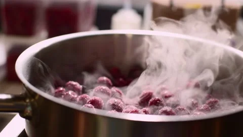 Close up. Process in the kitchen, caramelization of cherries. Stock Footage 233296827