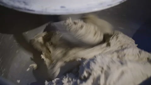 Close process of kneading wheat dough with an automated mixer on bakery factory 스톡 동영상 147255711