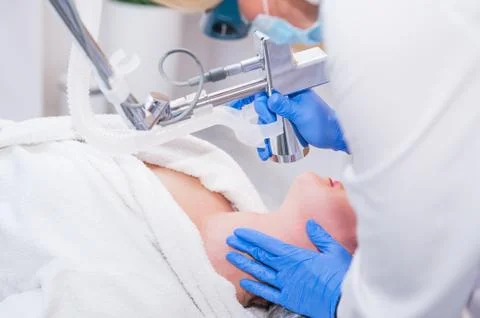 Close up process of laser peeling. Laser rejuvenation and skin treatment of p Stock-Fotos