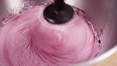 Close-up of the process of making cream, mousse, mixing the ingredients of pink Video stock 142335146