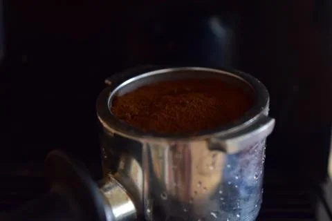 Close up of process of making espresso coffee on a coffee machine Stock Photos