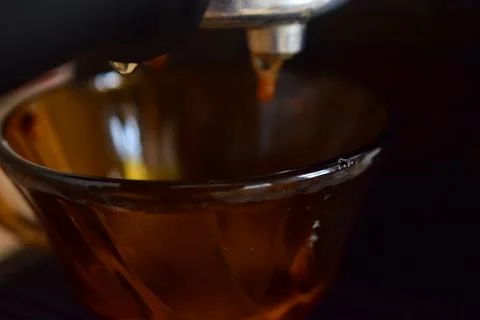 Close up of process of making espresso coffee on a coffee machine Stock Photos