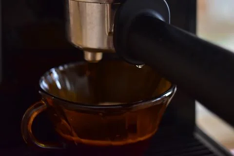 Close up of process of making espresso coffee on a coffee machine Stock Photos