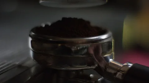 Close-up of the process of making hot coffee in a modern coffee machine, two Vidéo 106296319