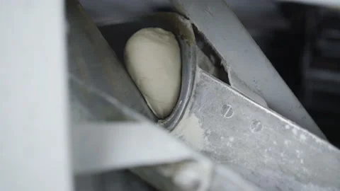 The close process of making loaves of wheat bread by automated machinery Video stock 146227874