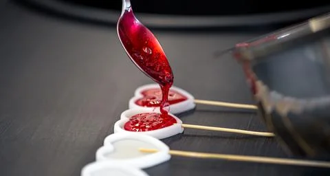 Close-up, the process of making lollipops from natural ingredients. Stock Photos