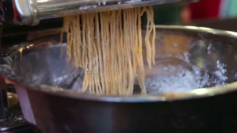 Close up of the process of making noodles using a hand mill Stock Footage 270347152