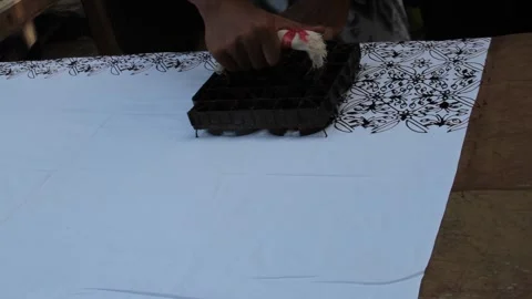 Close up of the process of making traditional Batik textile in Cirebon, Java, Video stock 289677097