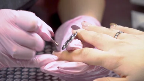 Close up of process of manicure at beauty salon Stock Footage 104432041