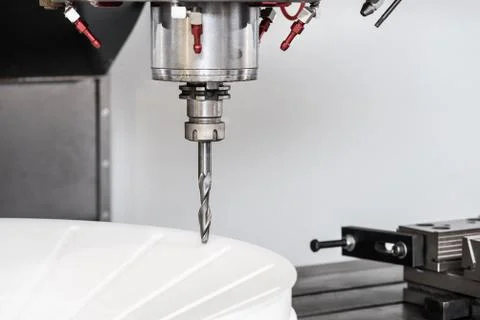 Close-up process of metal drill machining Stock Photos