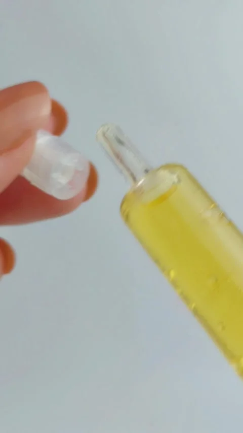 Close up process of opening and reassembling an anti acne serum product. Sk.. Stock Footage 331231486