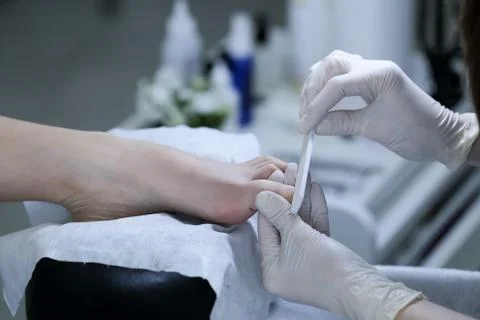 Close-up of the process pedicure in salon Stock Photos