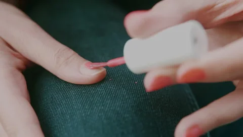 Close Up Process Of Pink Polish Applying Video stock 131096245