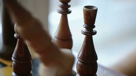 Close-up process of playing chess. Bishop moving and Rook falling on the board Stock Footage 103617751