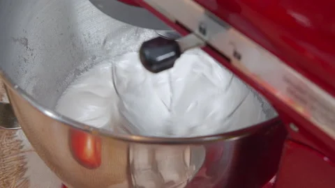 Close-up of the process of preparing icing sugar for Easter cake decoration Stock Footage 173460996