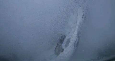 Close-up. The process of removing scale from the heating element of a washing Stockbeeldmateriaal 254001861