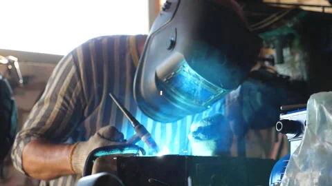 Close up processing of welding metal parts in garage. Mechanic or welder Stock-Footage 329223985