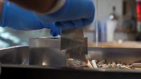 Close-up of the production of caramel candies and lollipops. Handmade sweets. Stock Footage 328024169