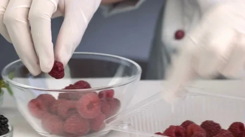 Close up of professional Chef or confectioner decorates cake Stock Footage 83015073
