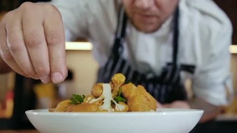 Close-up Professional Chef Restaurant Kitchen Cooking and Preparing Food Slow mo Stock Footage 142636350