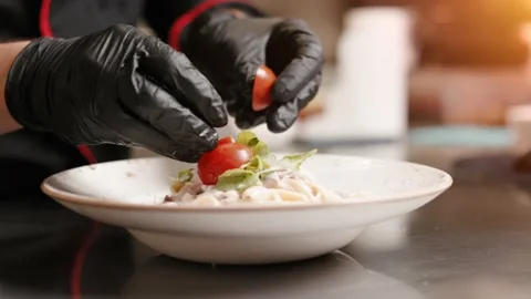 Close-up Professional Chef at Restaurant Kitchen Serves Dish Stock Footage 202204277