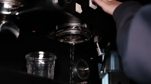 Close up of a professional coffee machine. loft dark coffee shop. slow motion Stock Footage 166591335