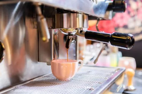 Close-up Of Professional Coffee Machine Making Espresso. Stock Photos