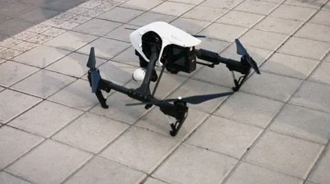 Close up of professional drone with the camera drone on the bridge over the Stock Footage 64618068