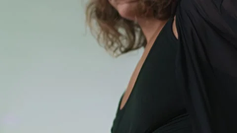 Close-up of professional female choreographer performing belly dancing indoors Stock Footage 245699334