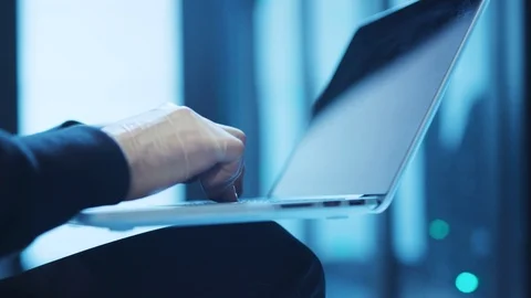 Close-up professional hacker attacking database, programming code on laptop Stock Footage 120693878