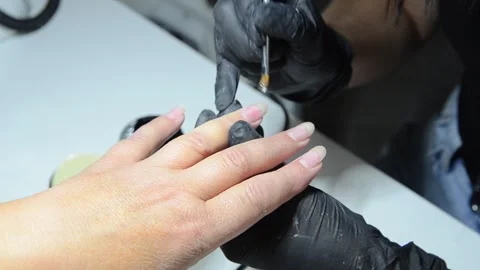 Close-up professional manicure and nail care in beauty salon Stock Footage 344038116