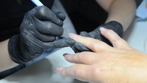Close-up professional manicure and nail care in beauty salon Stock Footage 344038138