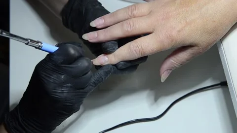 Close-up professional manicure and nail care in beauty salon Stock Footage 344038153