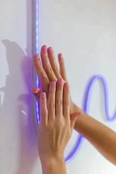 Close up of professional manicure process. Nail technician wearing gloves Foto stock
