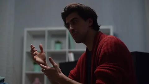Close-up of professional music teacher explaining gesturing to student how to Vídeos de archivo 150124871