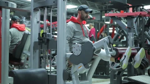 Close Up of Professional trainer and Bodybuilder workout at gym Stock Footage 143121208