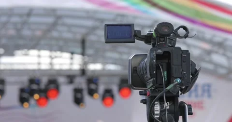 Close Up Of Professional Tv Camera Broadcasting Blurred Stage. Stock-Footage 143532154