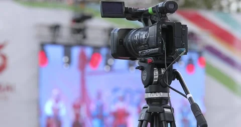 Close Up Of Professional Tv Camera Broadcasting Blurred Stage. Stock-Footage 143532163