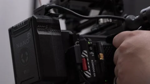Close-up of a professional video camera with a large v-mount battery. Stock Footage 194697990