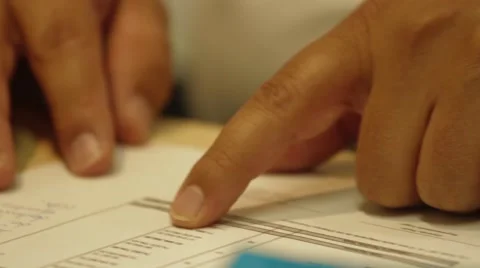 Close Up of professional worker checking a document Stock Footage 45236306
